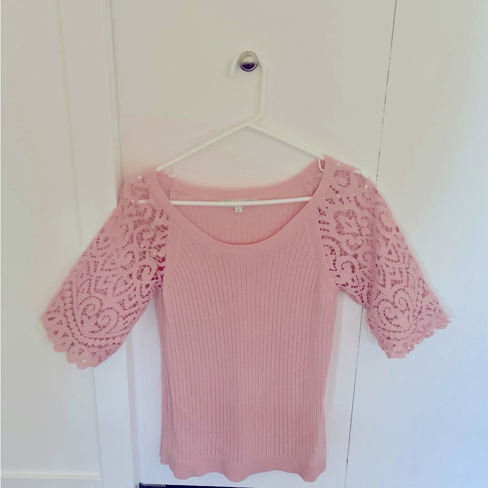 Beautiful brand new size small blouse. Beautiful Crochet work on hands.
